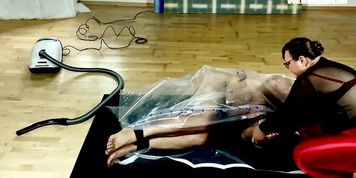 Miniatura de Mistress April Seals Her Slave in Latex - Breathless Punishment