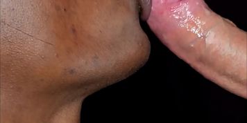 Miniatura de Close-up of an interracial oral encounter