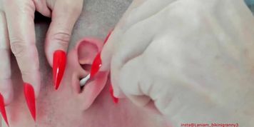 Miniatura de Elderly woman performs nail-focused massage in ASMR video