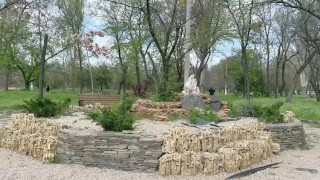 Miniatura de Mamada en un parque público