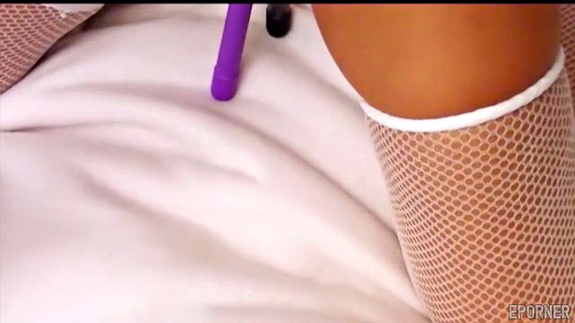 Miniatura de Lesbian Brunette Teases with Vibrator