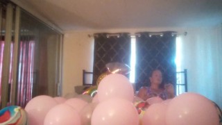 Miniatura de Milf with extreme long hair popping balloons and smoking cigarettes while filming up her own skirt